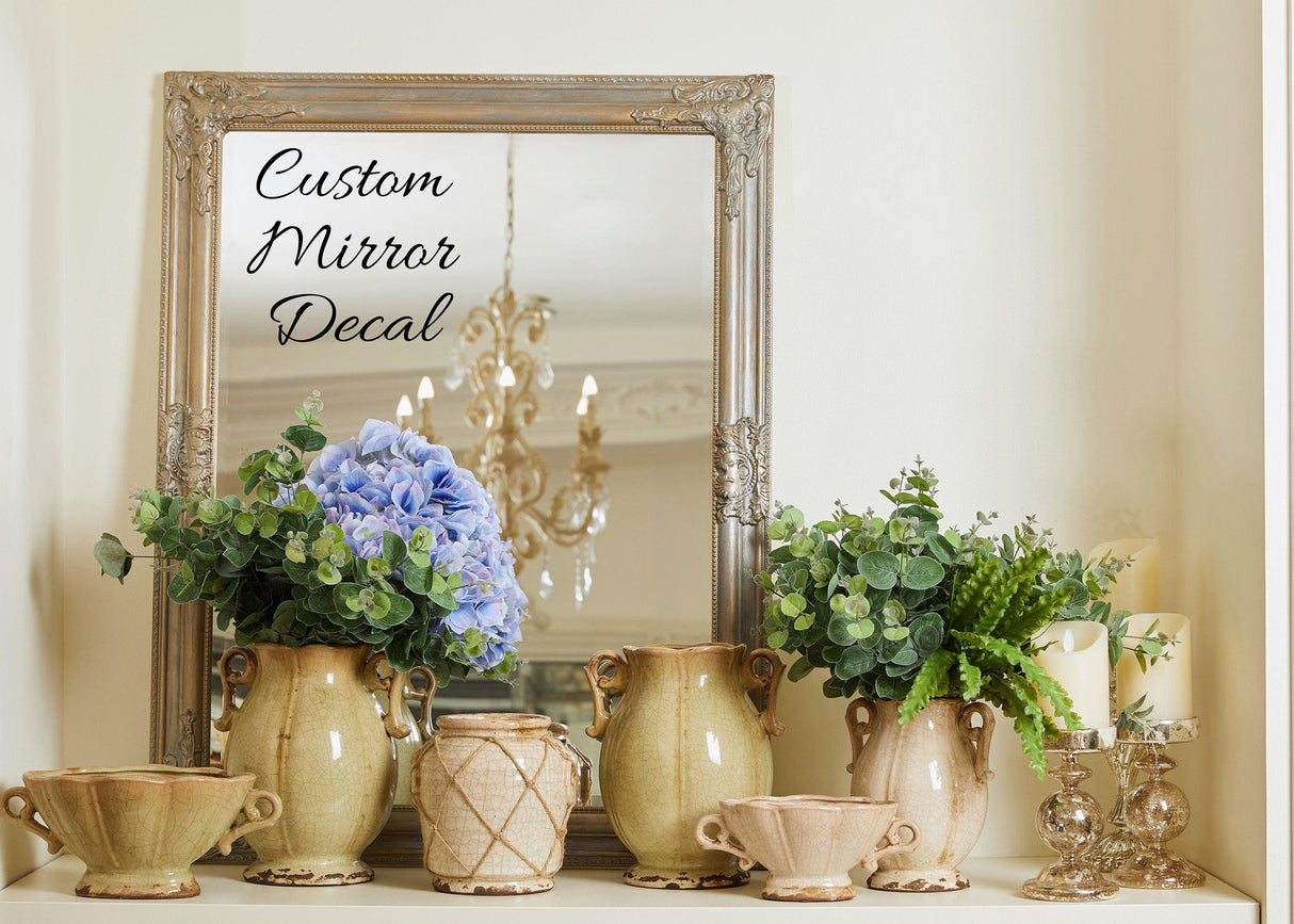 Customized glass mirror sticker with elegant floral decor and vintage vases for personalized home styling.