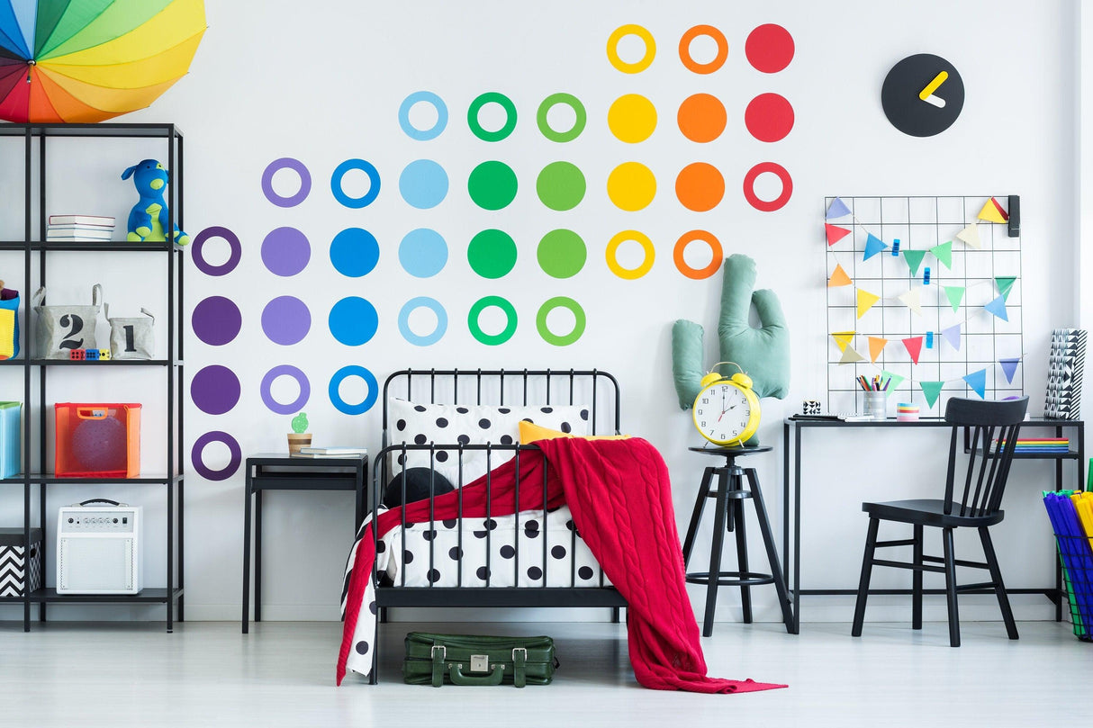 Colorful 36x Rainbow Circle Wall Decals applied in a modern children's room with a bed, desk, and shelves.