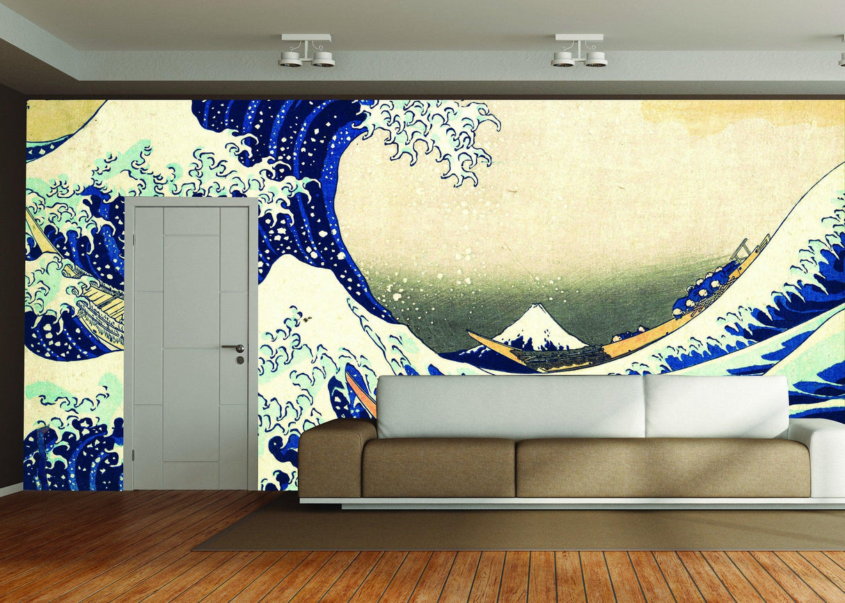 Kanagawa Wave wallpaper decal featuring dynamic blue waves and Mount Fuji in a modern living room setting.