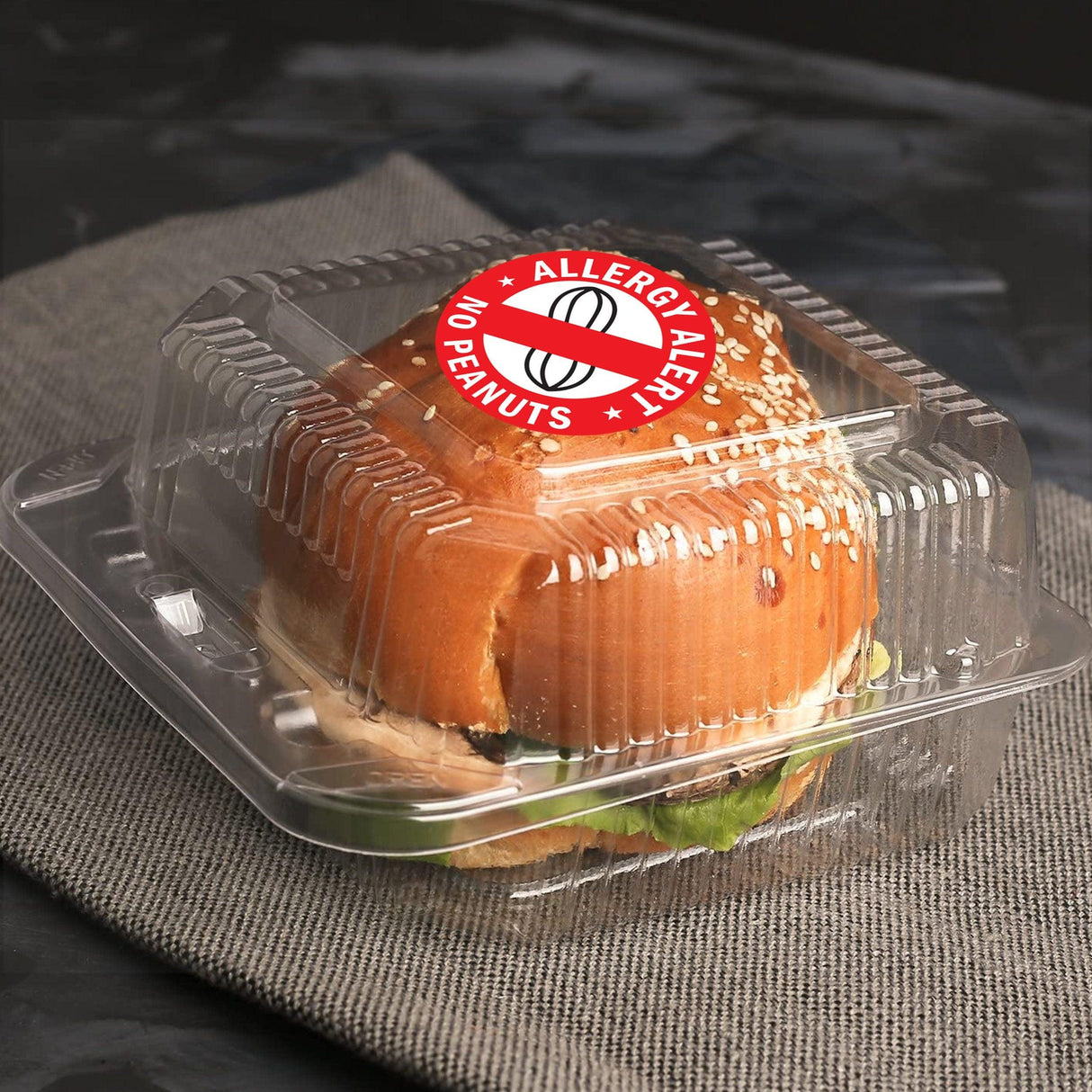 Allergy Alert No Peanuts sticker on a sandwich container for allergy safety in school lunches.