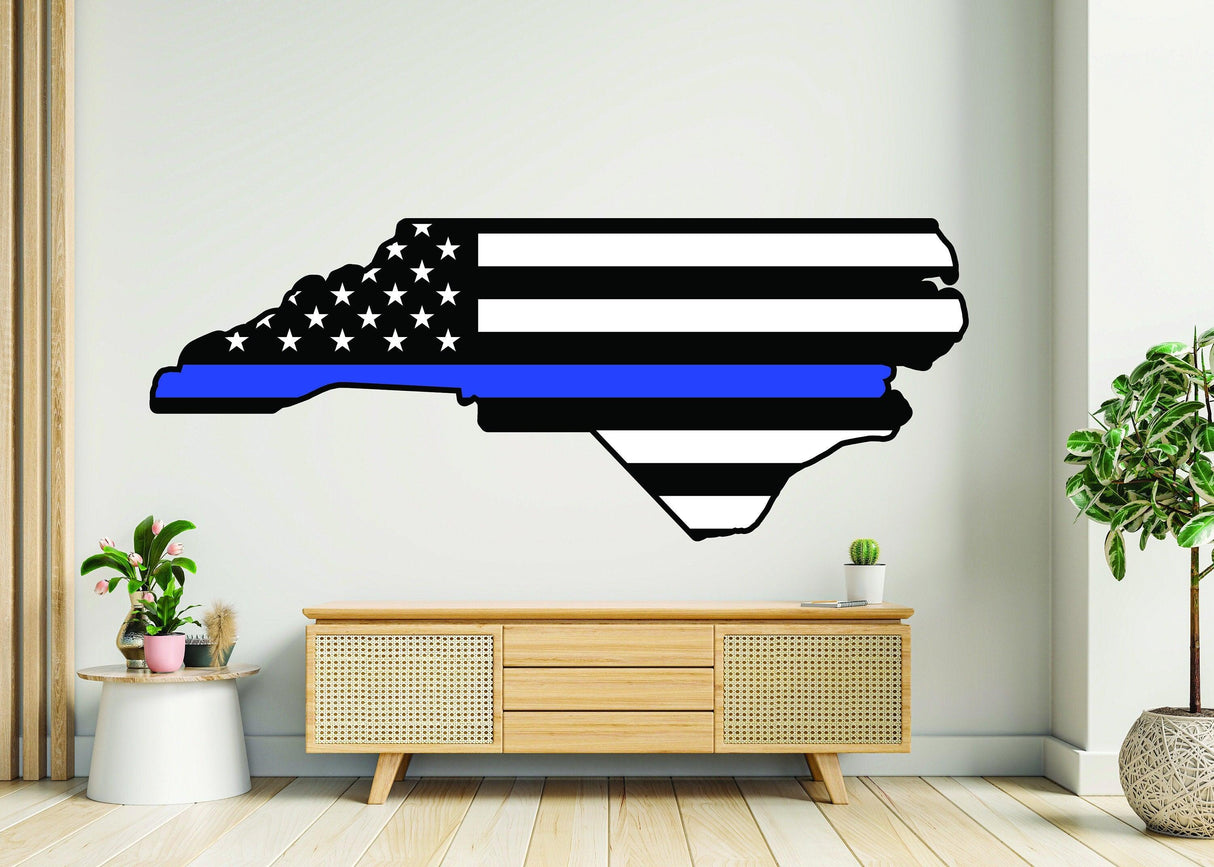 North Carolina vinyl wall sticker with black and white design and blue line, perfect for home decor.
