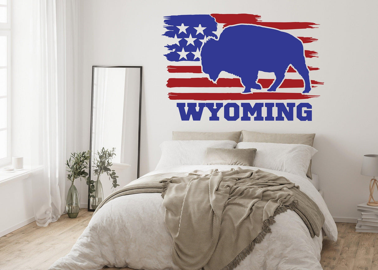 Wyoming state wall decal featuring a bison silhouette and American flag design, perfect for rustic home decor.