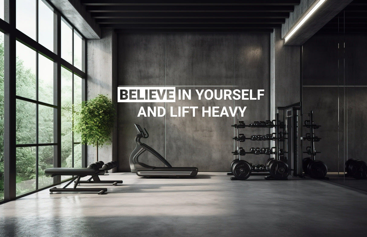 Motivational gym wall with the quote 'Believe in Yourself and Lift Heavy' in a stylish workout space.