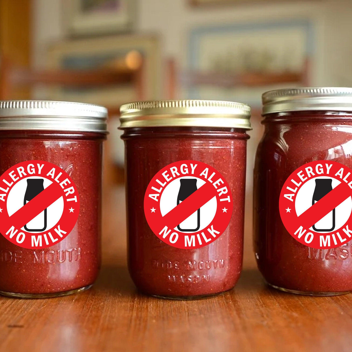 Three jars with No Milk Allergy Alert Stickers for food safety awareness.