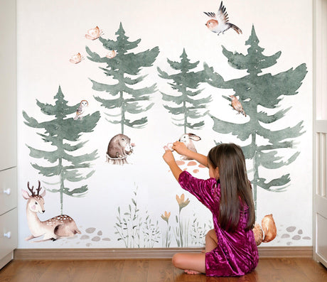 Child applying Woodland Wonders wall decals featuring forest animals and trees in a whimsical room setting.