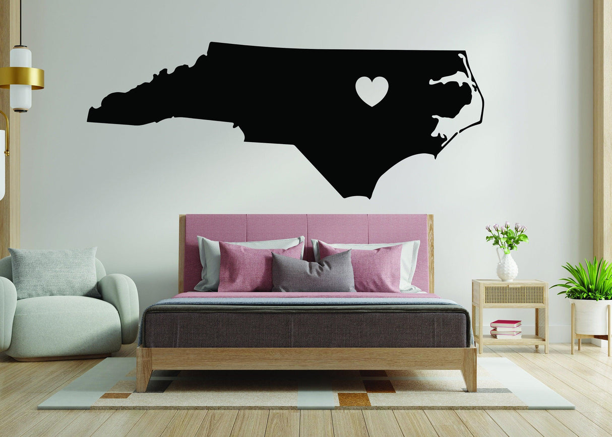 North Carolina vinyl wall decal with heart design, perfect for adding Tar Heel state pride to any room.