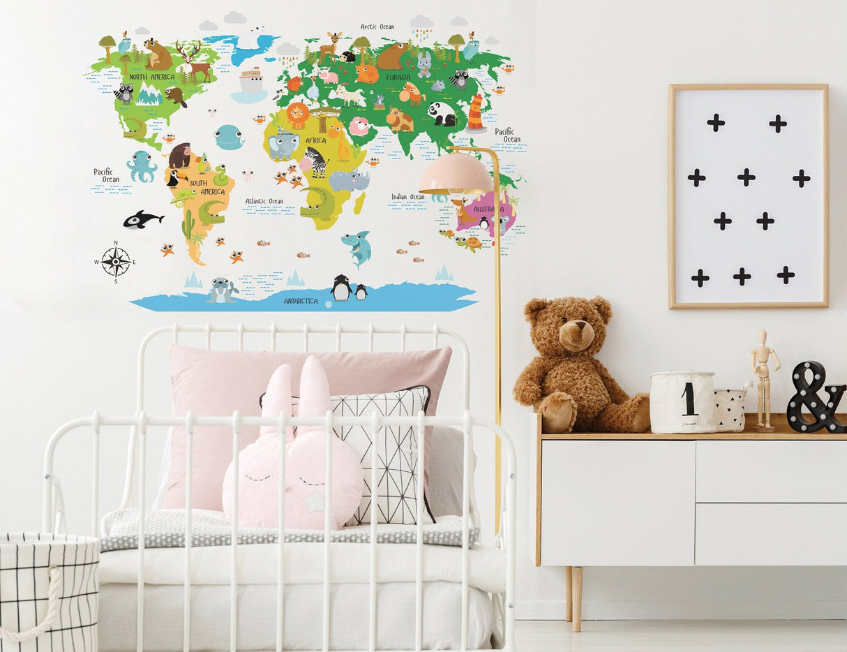 Colorful world map nursery wall sticker featuring animals and continents in a child's room with a cozy decor.