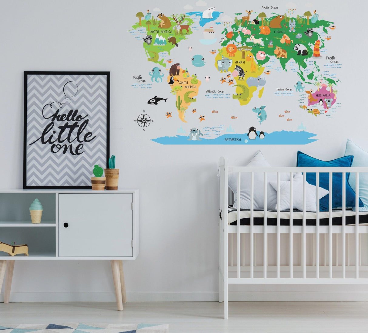 Colorful world map decal in nursery, featuring animals and countries, adding adventure to children's decor.