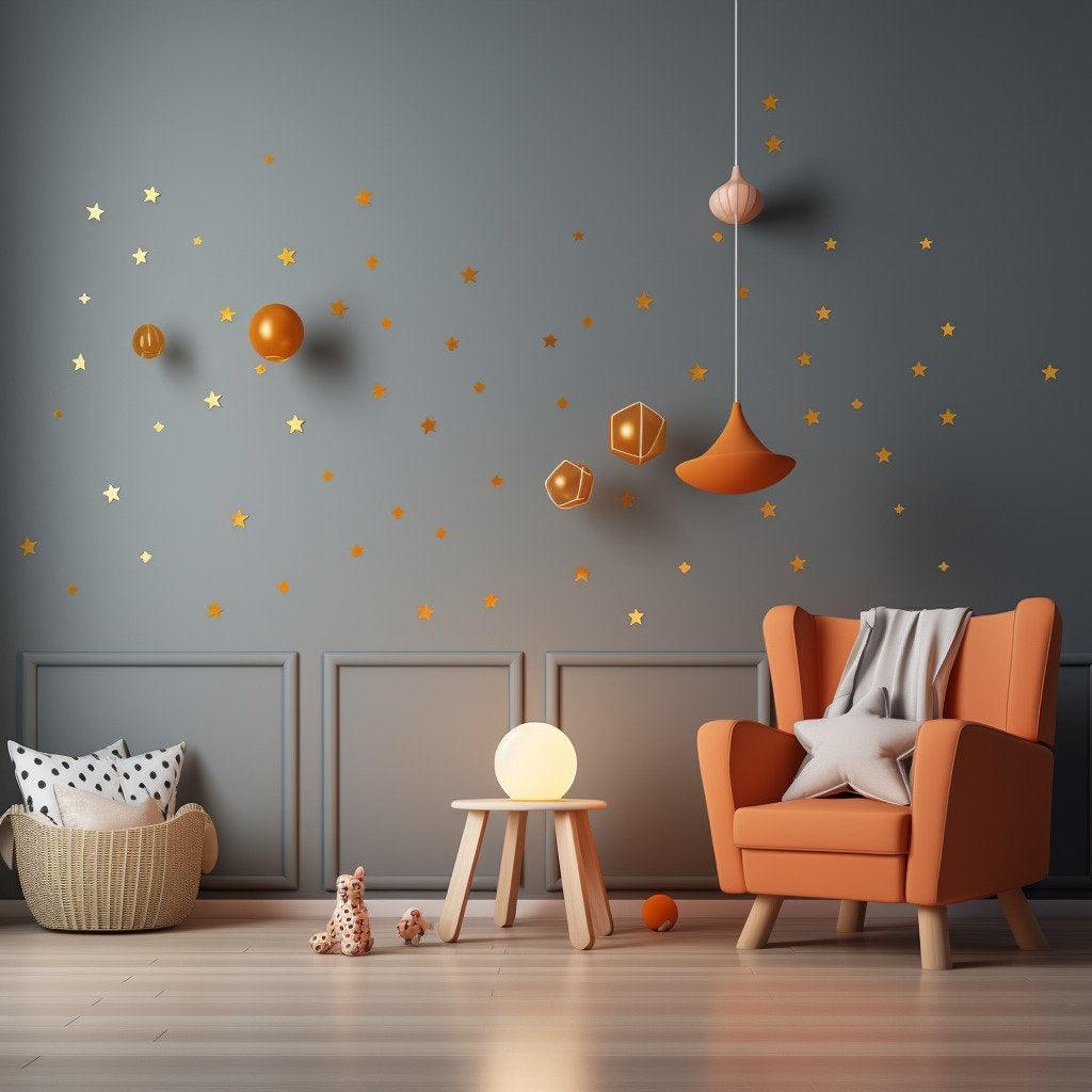 Elegant gold stars wall vinyl stickers in a stylish living room setting with orange furniture and soft decor.