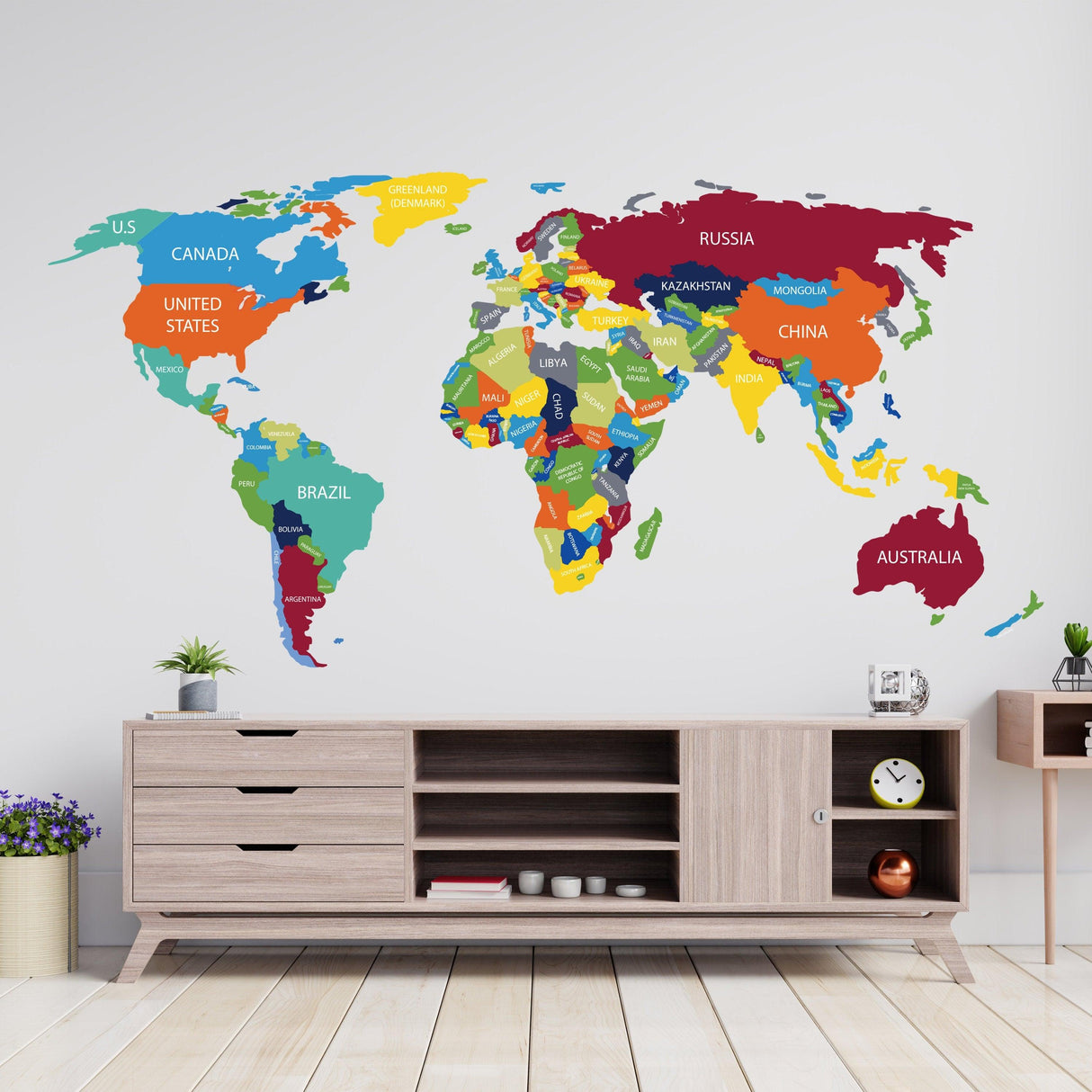 Colorful world map vinyl wall sticker with country names, ideal for home decor and global exploration.