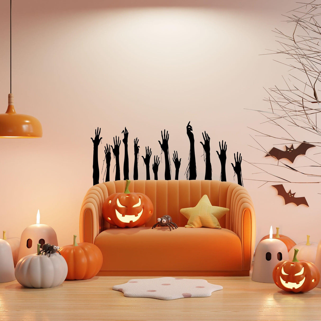 Halloween living room with zombie hand wall decals, orange sofa, pumpkins, and spooky decorations.