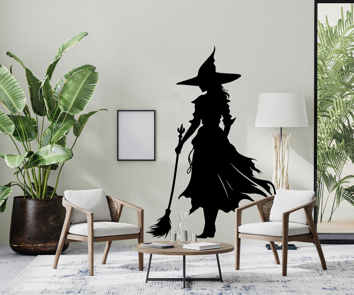 Wicked witch silhouette window decal in stylish living room decor for Halloween, featuring a spooky witch holding a broom.
