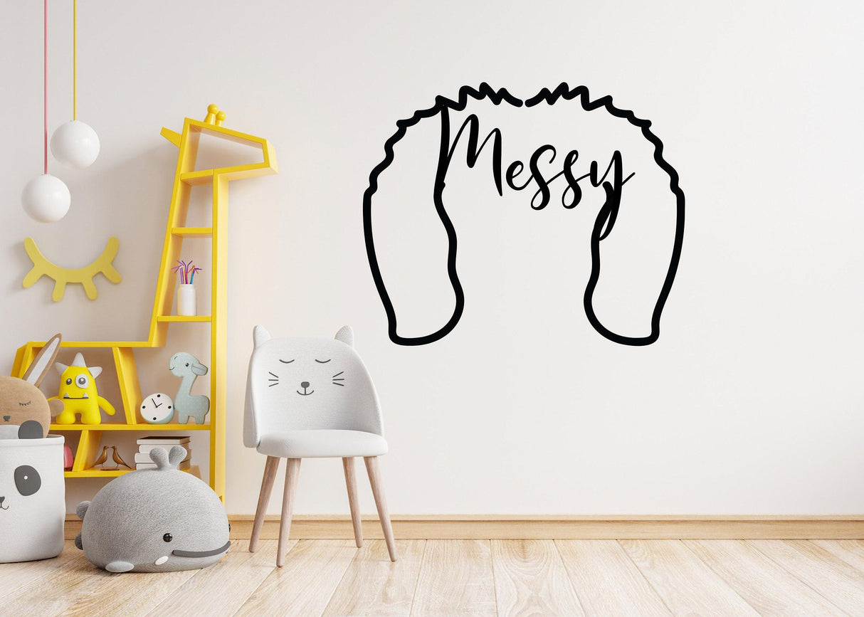 Custom pet ears decal featuring the word 'Messy' on a playful wall in a child's room.