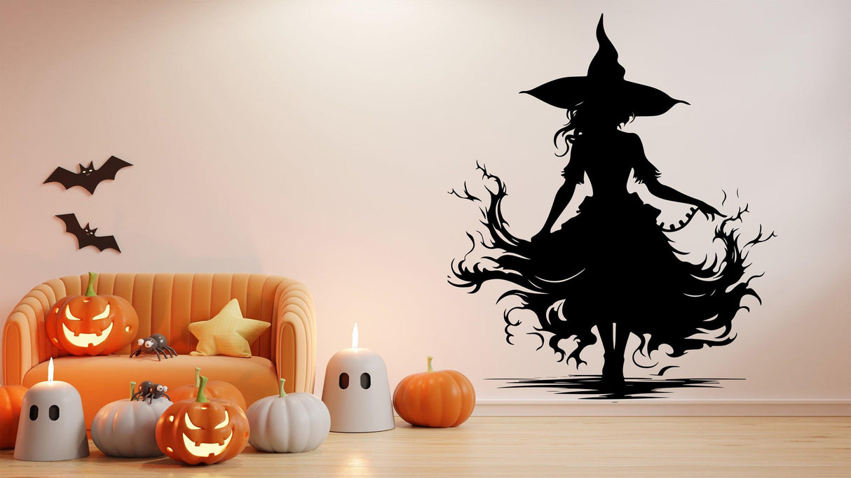 Sultry witch silhouette decal on wall with Halloween decorations and pumpkins in a cozy living room setting.