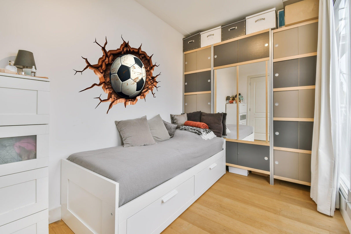 3D football wall decal in a boys room, creating a sporty atmosphere with realistic design and dynamic style.