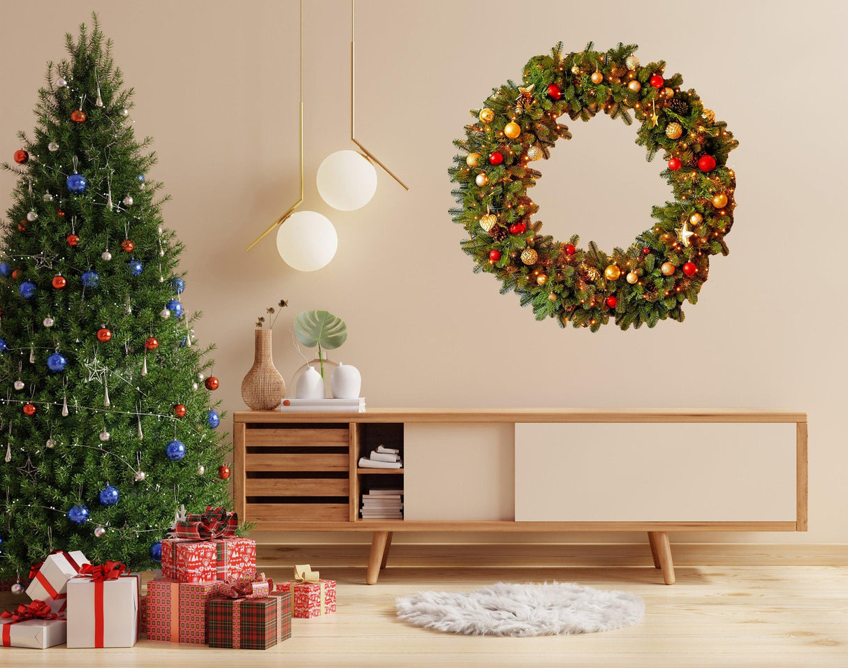 Festive Christmas wreath wall decal with lights and ornaments above modern furniture and a decorated Christmas tree.