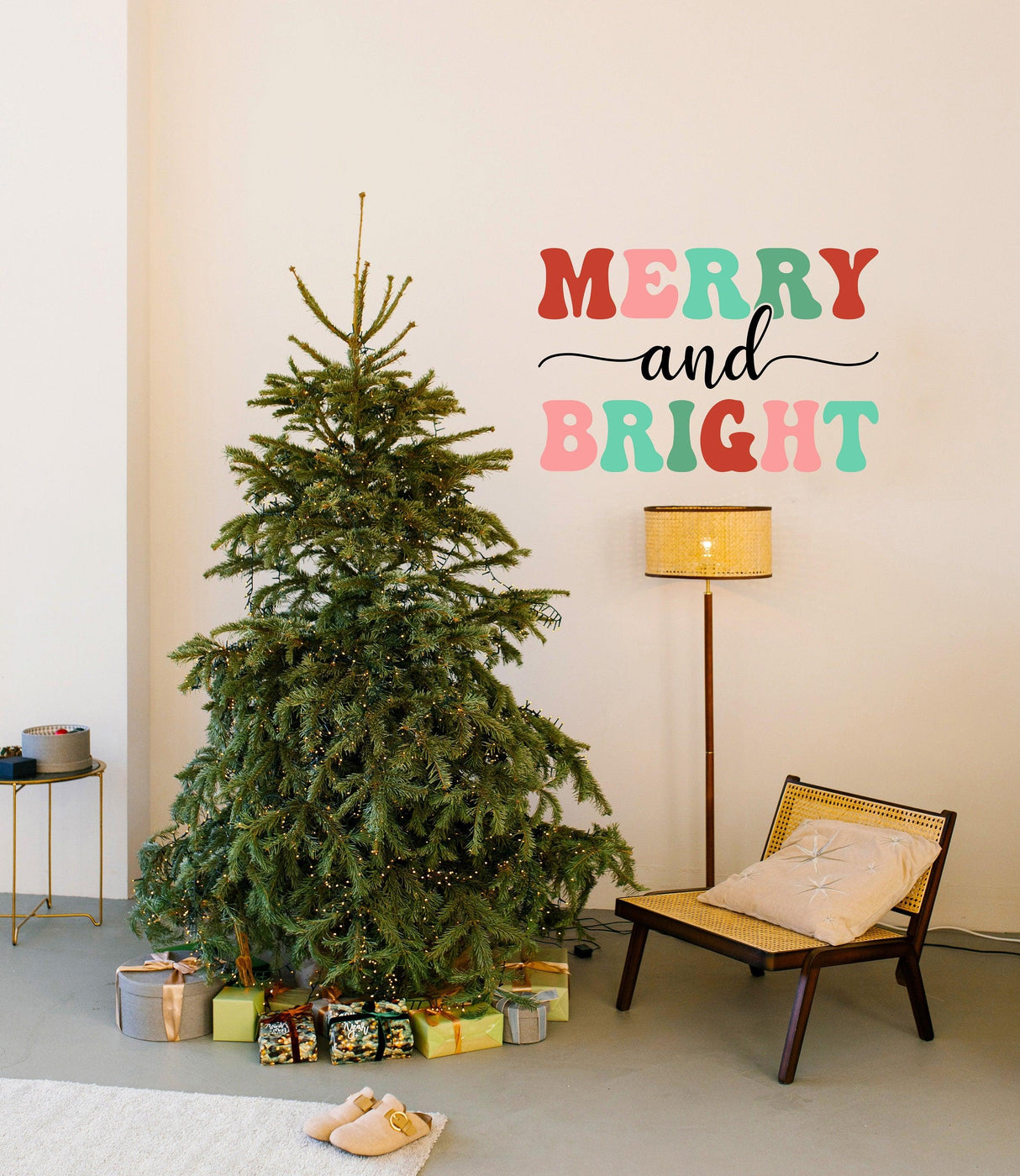 Merry and Bright colorful wall decal above a Christmas tree in a cozy living room setting.
