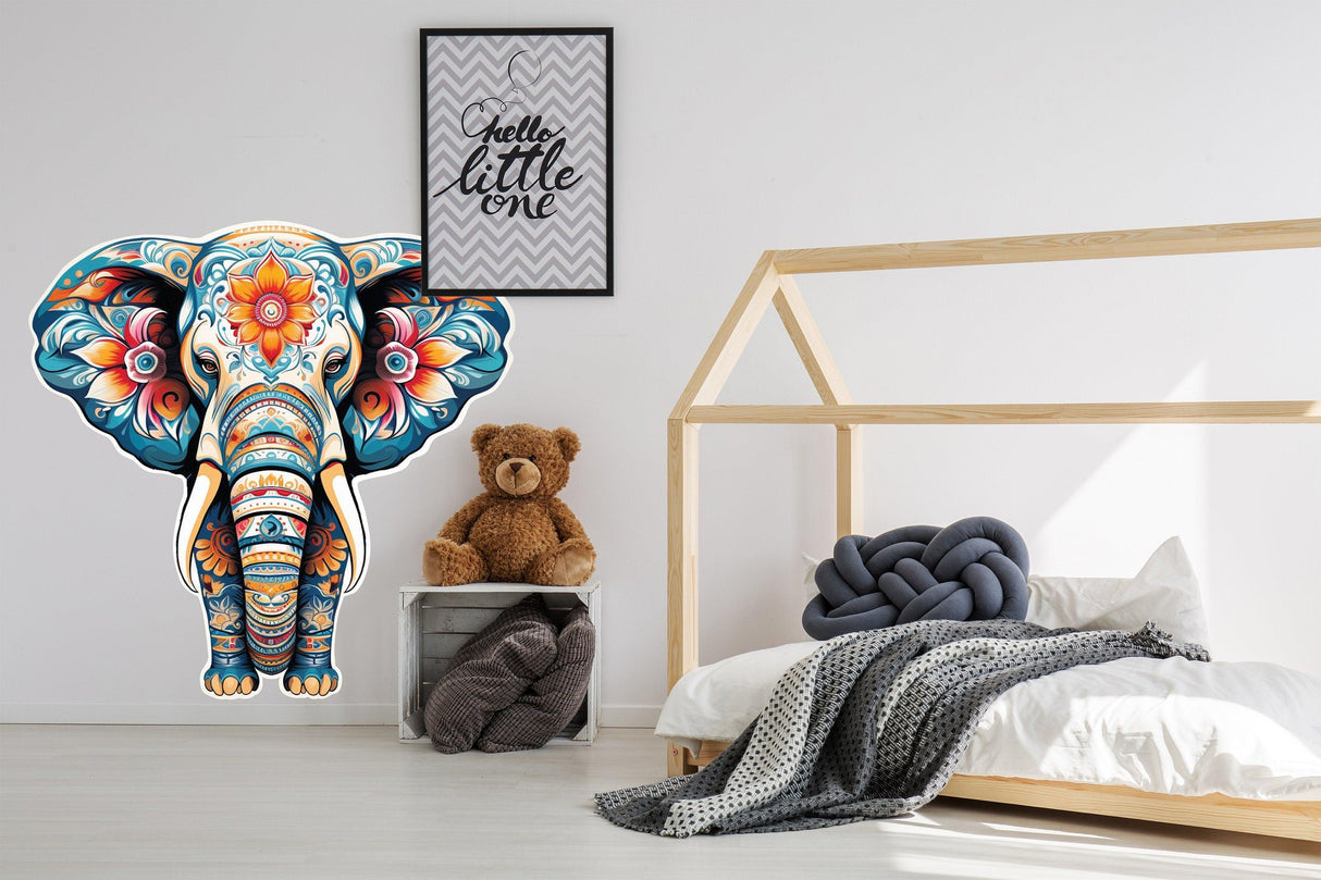 Floral elephant wall decal in colorful kids bedroom with bear and cozy decor. Perfect for nurseries and spiritual spaces.