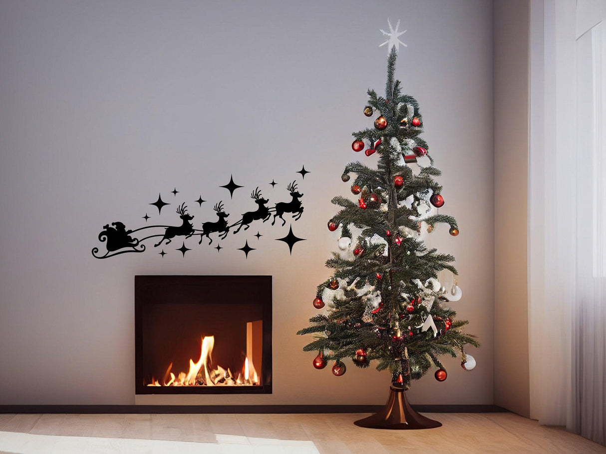 Christmas window decal of Santa and reindeer flying above a decorated tree and fireplace, creating festive decor.