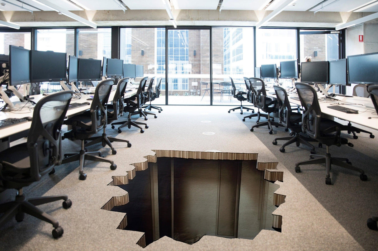 3D illusion hole floor sticker in modern office setting, creating a captivating porthole view.