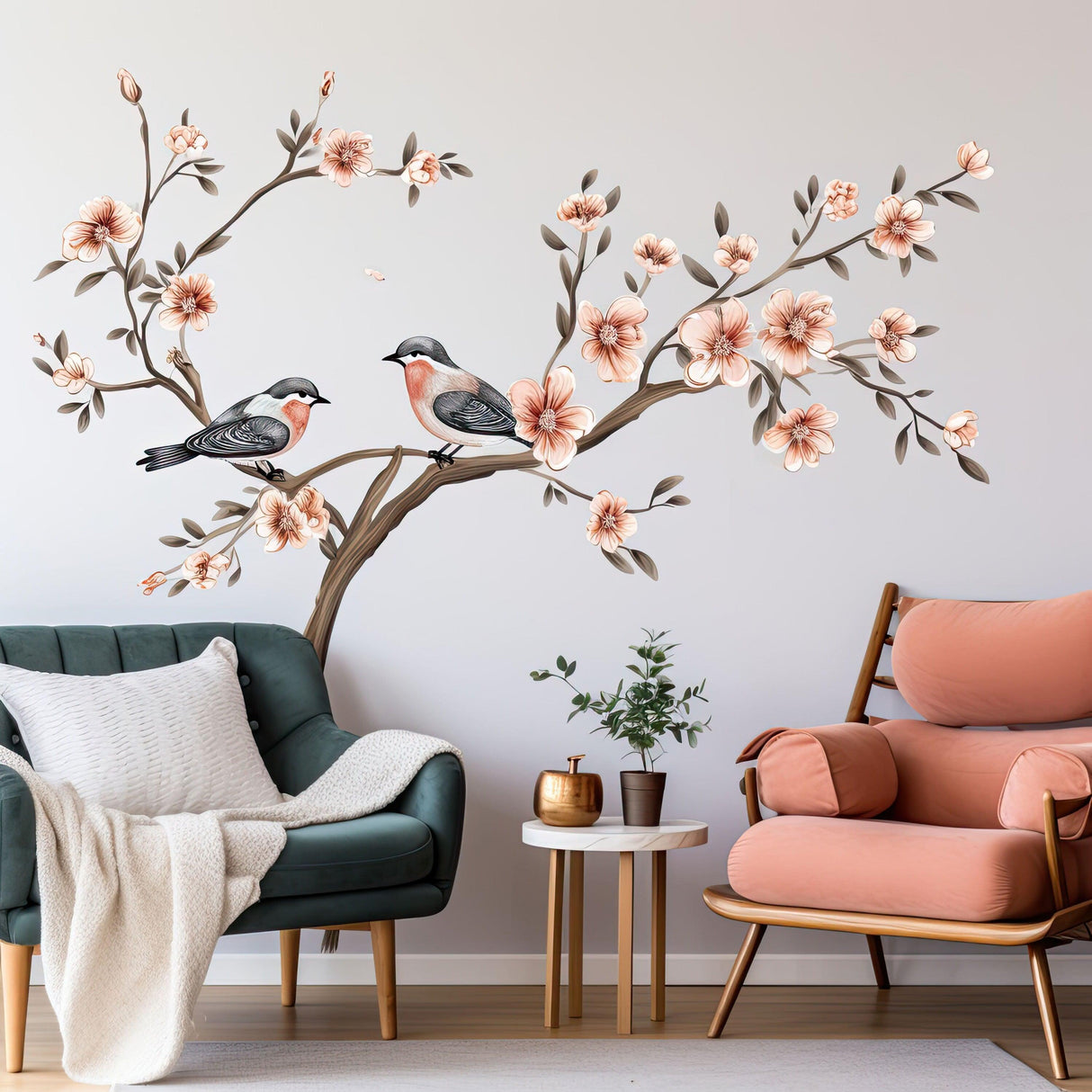 Elegant tree with pink blossom flowers and birds wall sticker in a stylish living room setting.