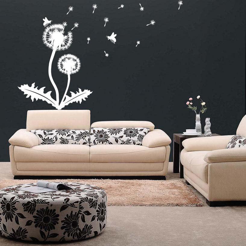 Dandelion vinyl sticker wall decal above a stylish beige sofa in a modern living room, enhancing the decor with nature.