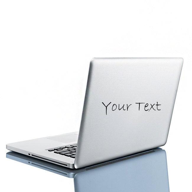 Custom die cut vinyl sticker on a laptop with personalized text design for branding and decor.