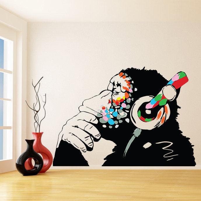 Colorful monkey mural with headphones, creating a lively and modern wall art design in a stylish interior.
