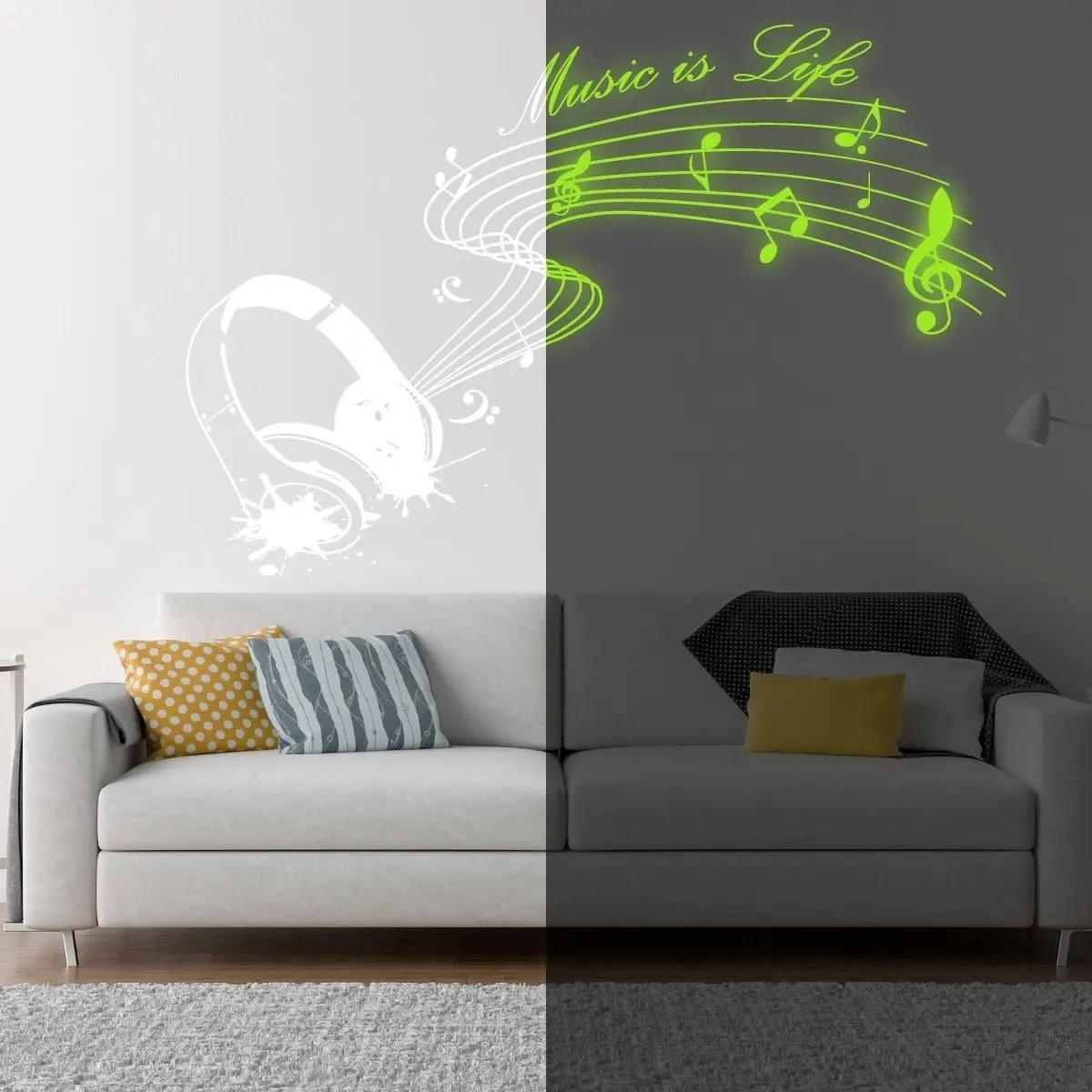 Glow in the dark wall decal with musical notes and headphones in a stylish living room setting.