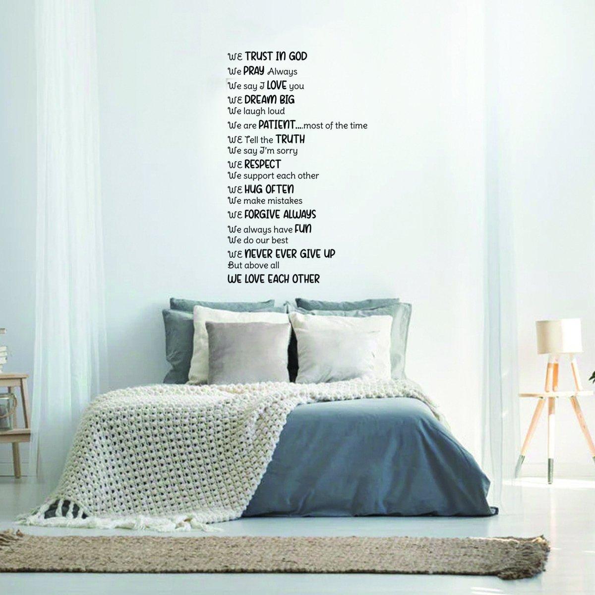 Inspirational family quote wall decal in a cozy bedroom, emphasizing love and faith with uplifting messages.
