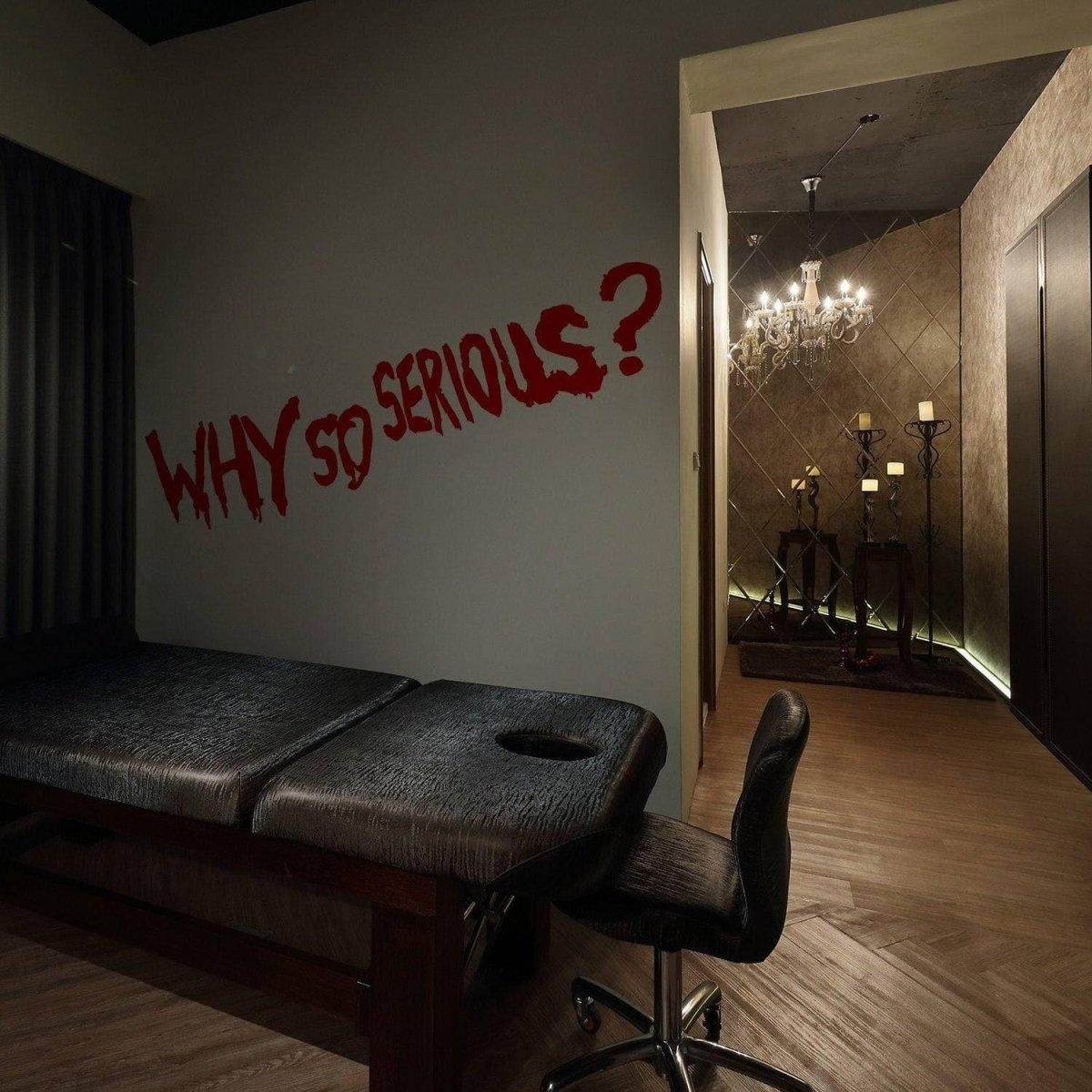 Joker-themed vinyl wall decal with text 'WHY SO SERIOUS?' in a stylish interior room setting.