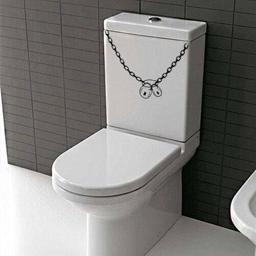 Funny bathroom decor featuring a chain and padlock sticker on a modern toilet.
