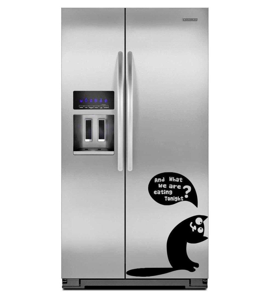Whimsical fridge with cute cat sticker asking 'And what are we eating tonight?' for decorative kitchen fun.
