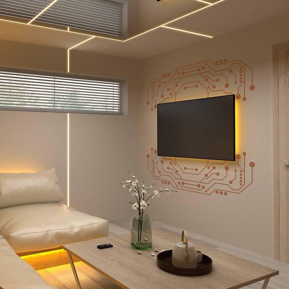 Stylish vinyl decals displaying a circuit design around a mounted TV, enhancing modern living room decor.