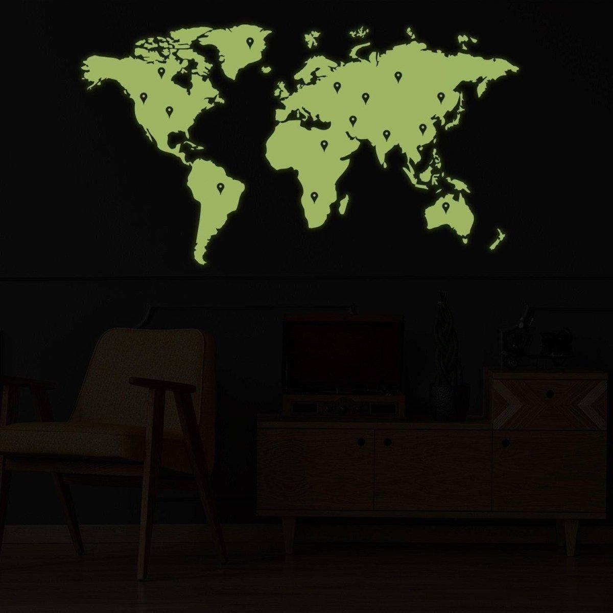 Glowing Earth wall sticker illuminating a dark room, featuring a luminous world map design.