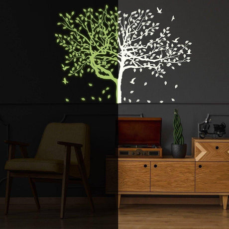 Glow-in-the-dark forest wall decal showing luminous tree design in dark room for home decor.
