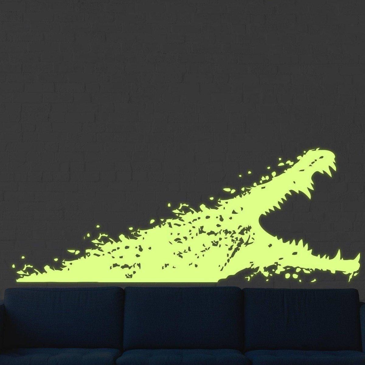 Glowing alligator wall decal on dark wall, perfect night light decor for kids' rooms.
