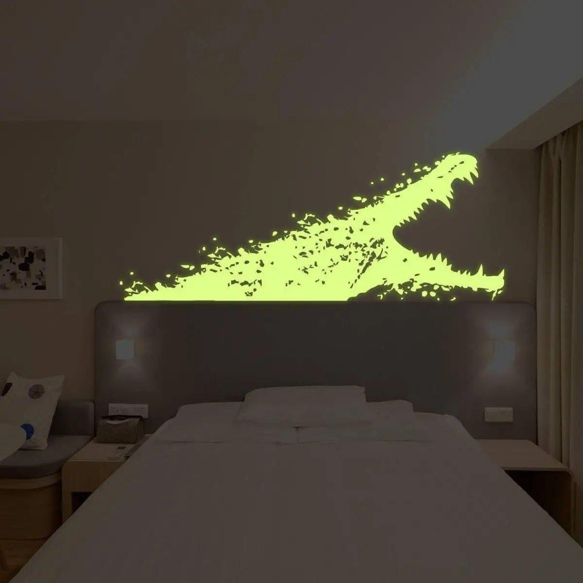 Glowing alligator wall decal creating a magical night light effect in a kids room, perfect for enchanting decor.