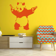 Artistic urban panda wall decal in orange on a vibrant yellow wall, enhancing modern interior design.