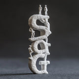 3D printed sculpture of the letters S, O, and G with miniature figures on top, showcasing unique design and craftsmanship.