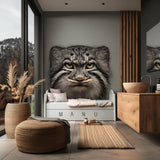 Large vinyl wall decal of a realistic Pallas’s cat face, printed in full color and applied to a wall above a child's bed. The design has no background and blends seamlessly into a modern natural-toned room interior.