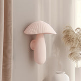 3D printed wall decor shaped like a soft pastel ribbed mushroom with elongated stem, minimalist matte PLA sculpture mounted on a neutral interior wall