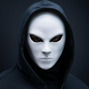 Faceless 3D printed phantom mask with a smooth anonymous design and narrow eye openings.