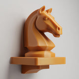 3D printed wall-mounted shelf featuring a chess knight horse head rising from a compact floating ledge, designed as strategy-themed wall decor.