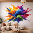 A high-impact 3D illustration of a multi-colored paint explosion on a white background. Thick, glossy streams of blue, pink, yellow, and green paint burst outward from the center with realistic droplets and shadows.
