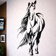 A minimalist black-and-white line art illustration of a full-body horse on a white background. The horse is depicted in a walking or trotting pose, with bold, fluid lines defining its muscular form, flowing mane, and long tail.