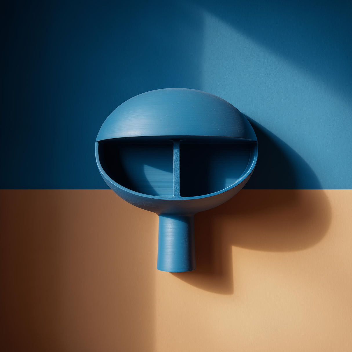 3D printed dome niche wall shelf with two split compartments and a small stem-like support, minimalist floating wall display mounted in warm natural light.