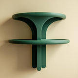 3D printed double tier wall shelf with two rounded ring-style ledges and a sculptural central support, visible print texture, mounted on a plain wall.