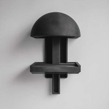 3D printed mushroom-inspired wall mounted shelf with a domed canopy top and a small rectangular floating ledge tray, visible print texture, mounted on a clean wall.