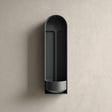 3D printed arched niche wall shelf with a tall recessed alcove and a small built-in bowl tray at the bottom, minimalist design mounted on a textured wall.